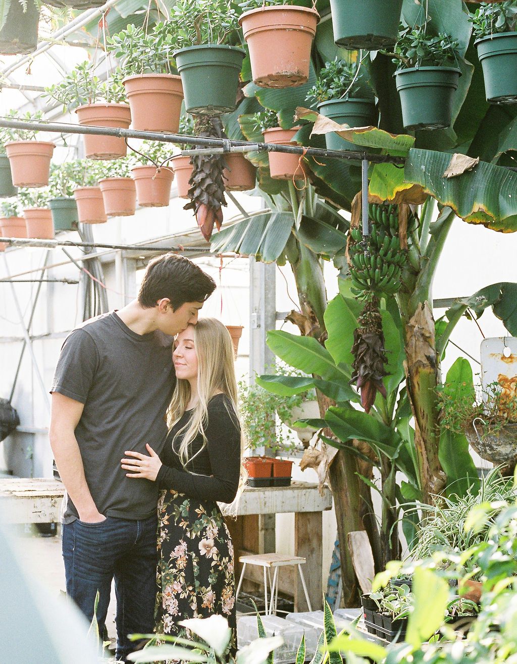 Engaged Couple Greenhouse