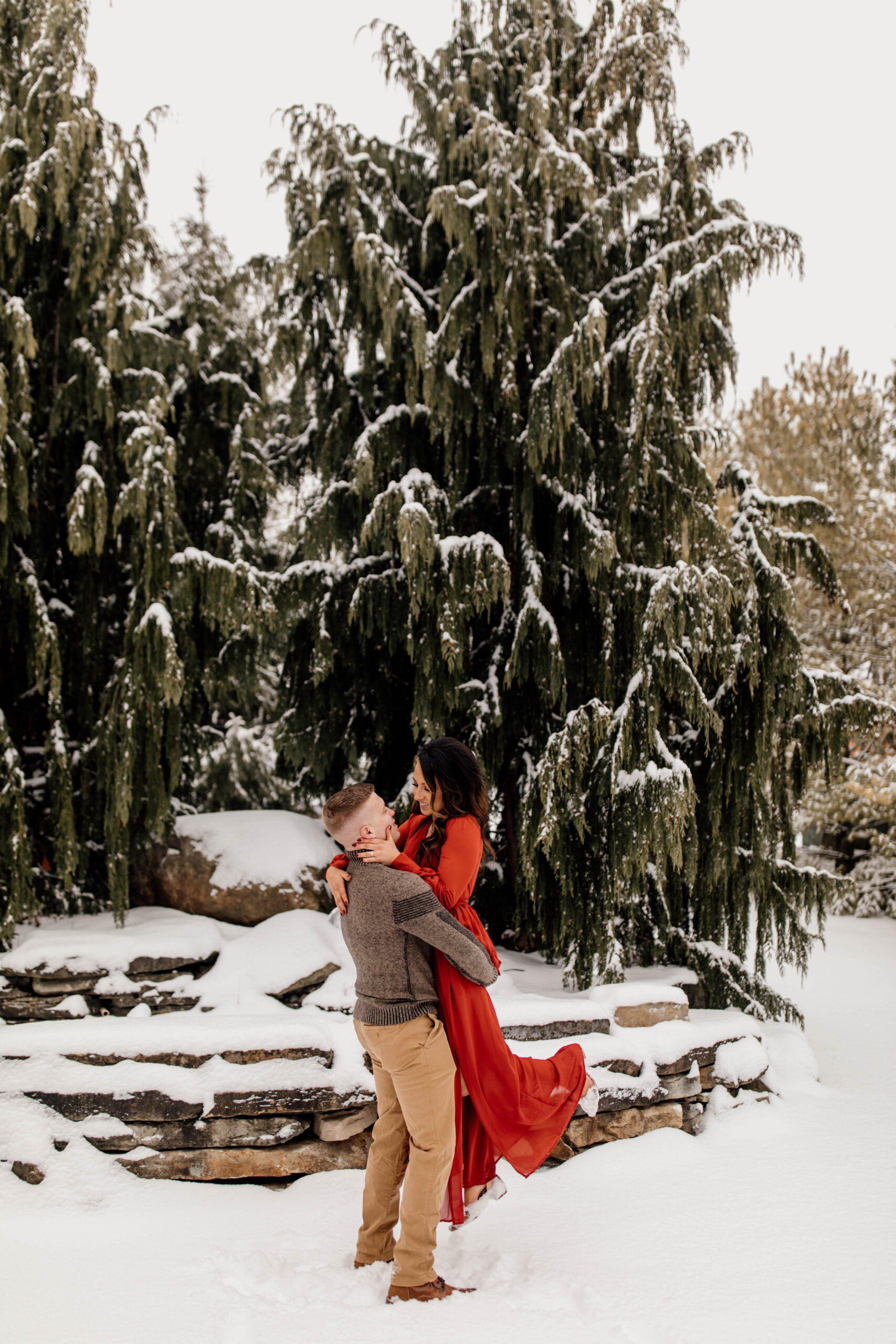 Engaged Couple Snow Lift