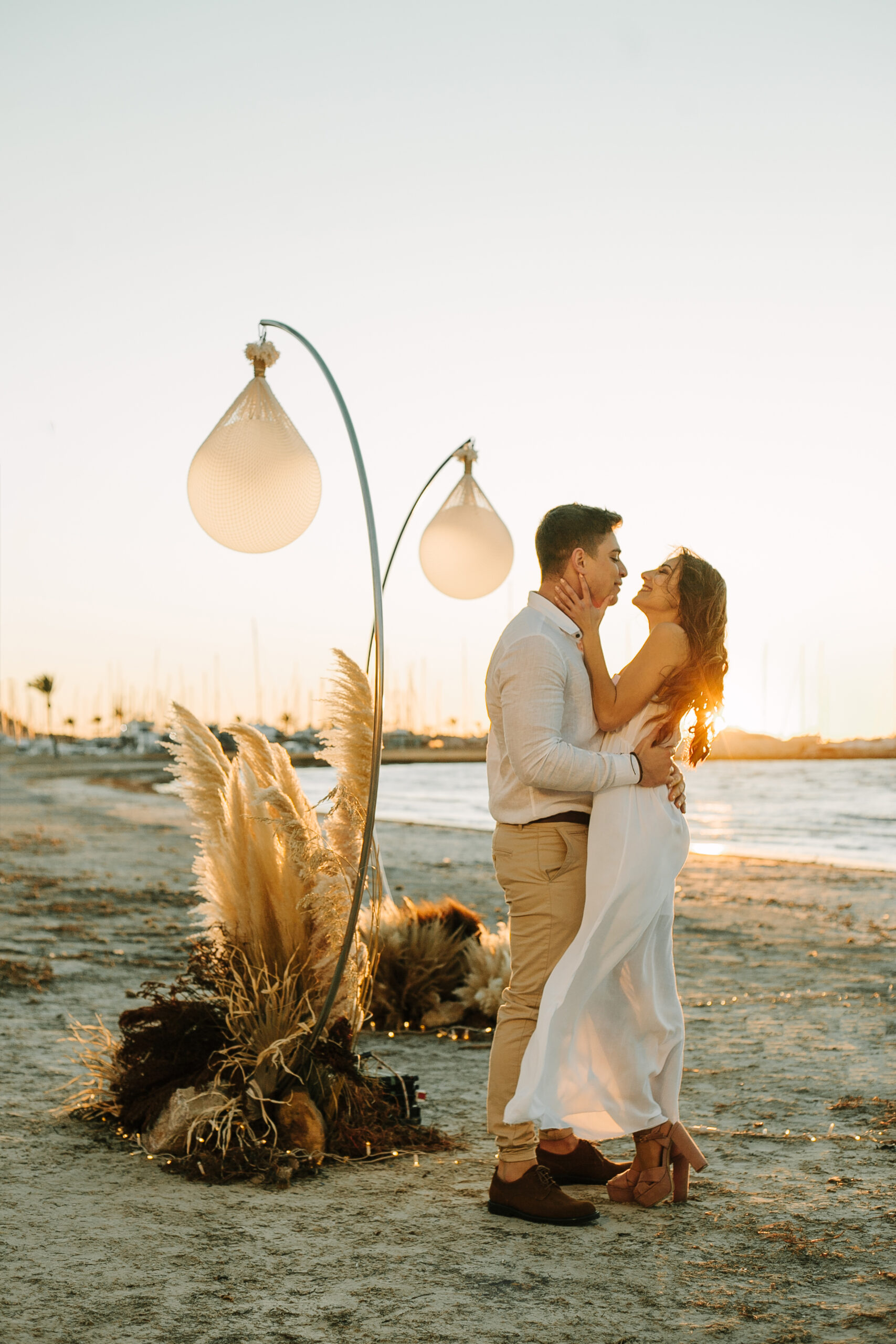 Engaged Couple at Sunset Beach